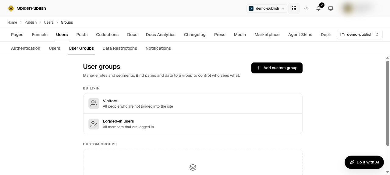 The User Groups tab showing the two built-in groups, Visitors and Logged-in users, above an empty Custom groups section